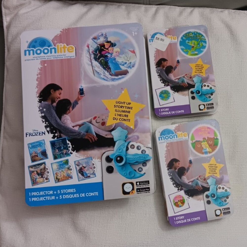 Moonlite Projector (New in Box) for Smartphone, and 7 Stories including Frozen !